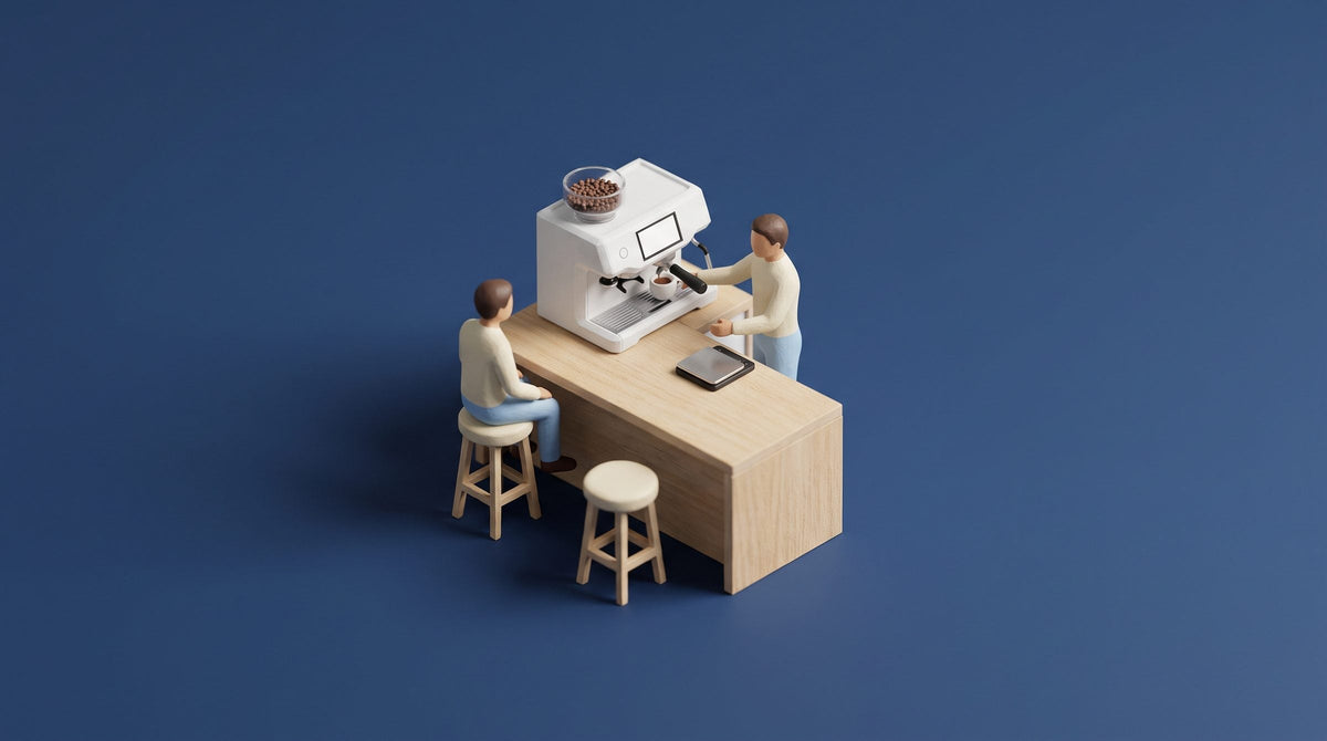 Miniature model of a white all-in-one espresso machine with a built-in grinder on a wooden breakfast bar, one figure pulling a shot and another watching from a stool
