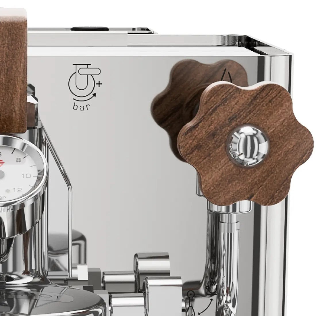 The Bianca walnut flow-control paddle above the group, with the flow diagram etched into the steel top panel, official photography