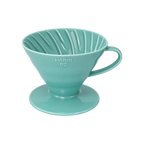 Hario V60-02 Dripper — Ceramic / Turquoise; consistent elevated view, square transparent image
