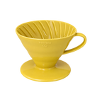 Hario V60-02 Dripper — Ceramic / Yellow; consistent elevated view, square transparent image