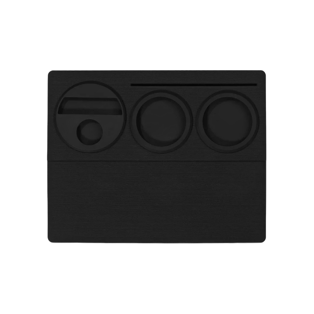 Normcore Espresso Tamping Station V2 — Black; consistent elevated view, square transparent image