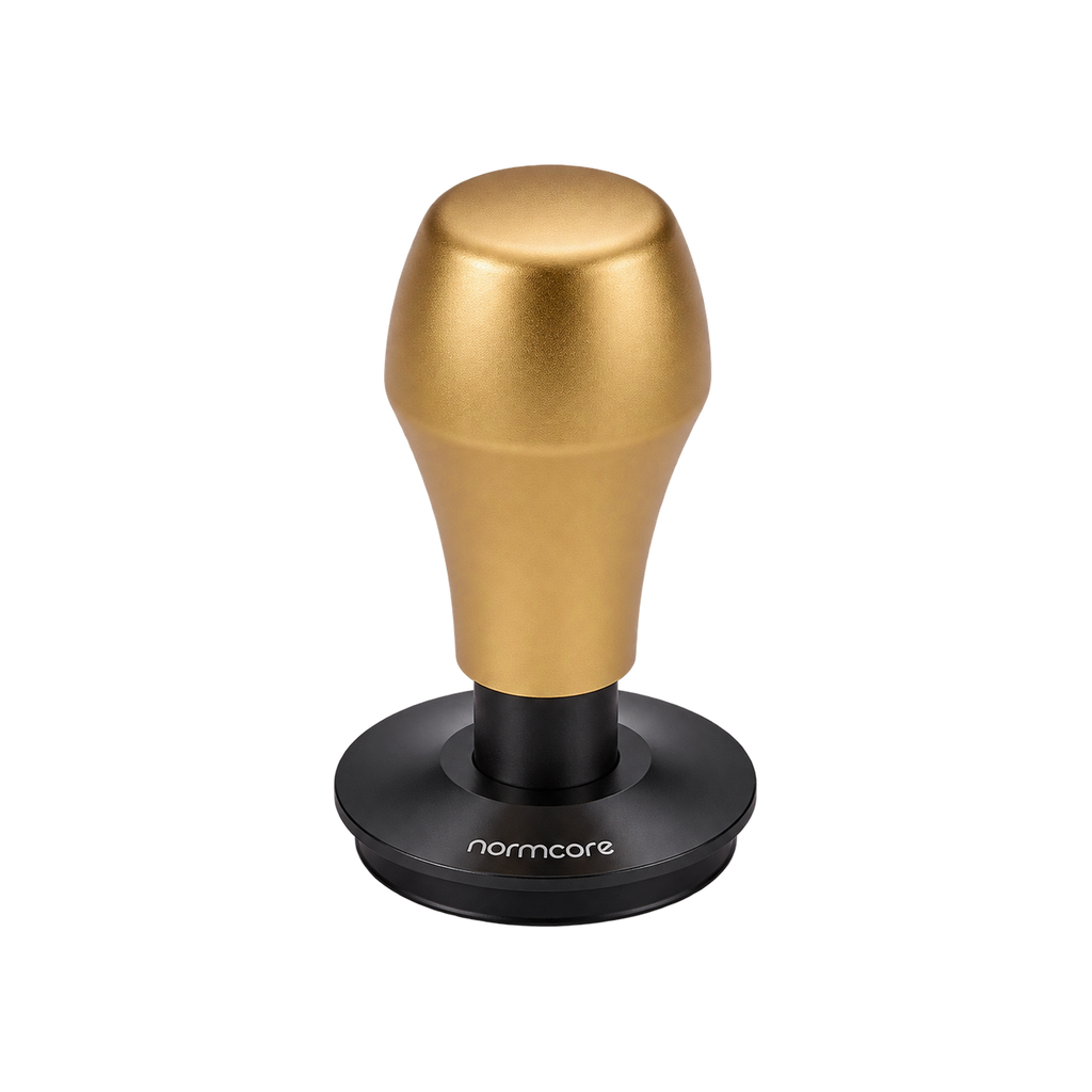 Normcore Spring-loaded Tamper V4 — Titanium PVD, Gold / 51mm / Flat Base, Titanium PVD, Gold / 51mm / Ripple Base, Titanium PVD, Gold / 53.3mm / Flat Base, Titanium PVD, Gold / 53.3mm / Ripple Base, Titanium PVD, Gold / 58.5mm / Flat Base, Titanium PVD, Gold / 58.5mm / Ripple Base, Titanium PVD, Gold / 45.5mm / Flat Base, Titanium PVD, Gold / 45.5mm / Ripple Base; consistent elevated view, square transparent image