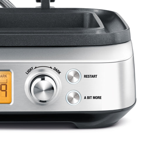 The Smart Waffle Pro LCD, browning dial, Restart and A Bit More buttons up close, official detail