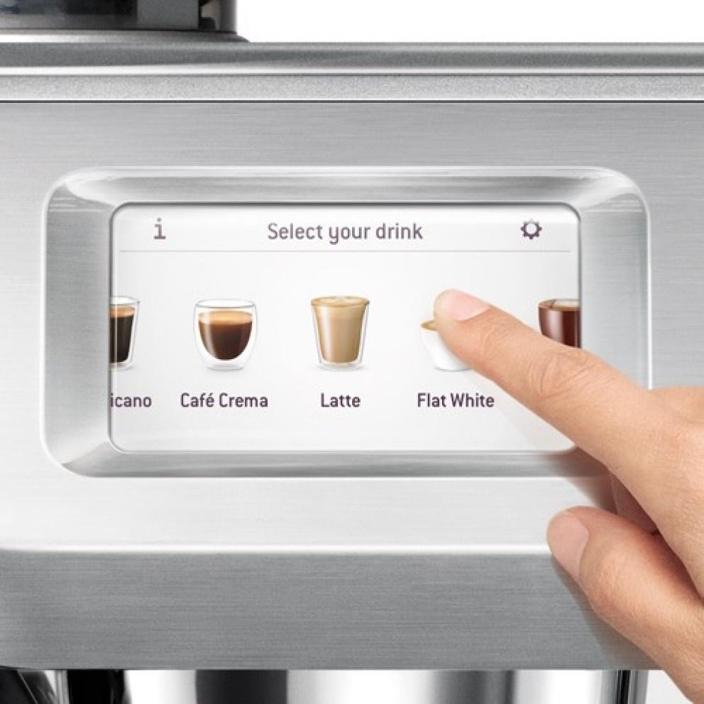 A finger selecting Flat White on the Oracle Touch screen, official Sage photography